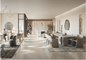 View of Yachtside Marina Residences at sunset with buildings, palm trees, and beach