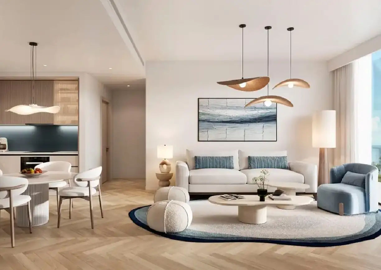 View of Yachtside Marina Residences at sunset with buildings, palm trees, and beach