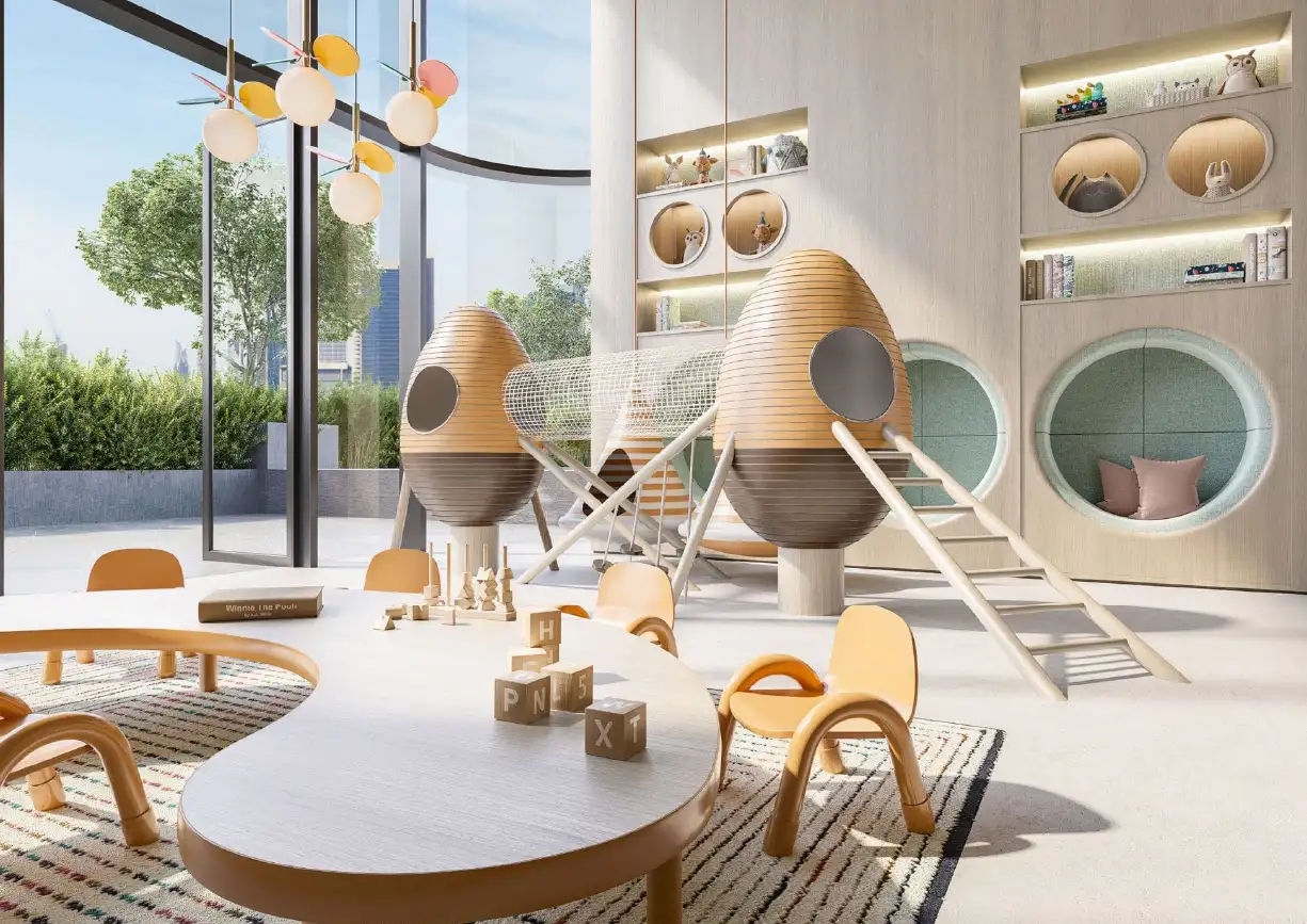 View of Yachtside Marina Residences at sunset with buildings, palm trees, and beach