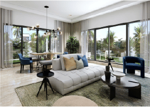 View of Yachtside Marina Residences at sunset with buildings, palm trees, and beach