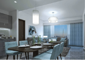 View of Yachtside Marina Residences at sunset with buildings, palm trees, and beach