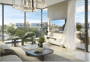 View of Yachtside Marina Residences at sunset with buildings, palm trees, and beach