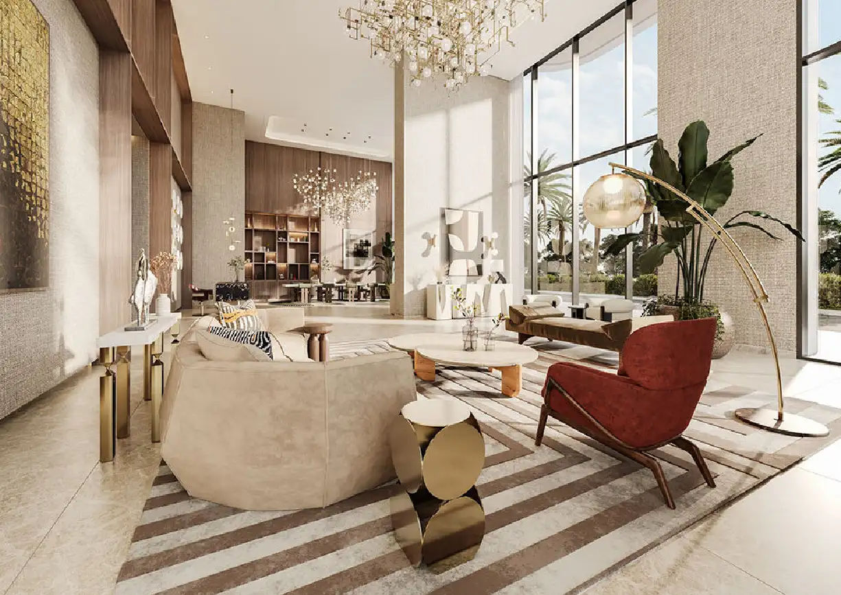 View of Yachtside Marina Residences at sunset with buildings, palm trees, and beach