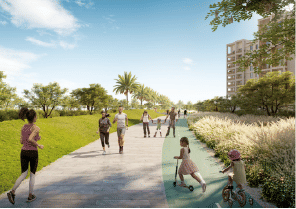 View of Yachtside Marina Residences at sunset with buildings, palm trees, and beach