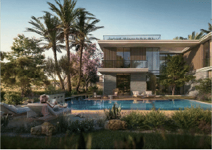 View of Yachtside Marina Residences at sunset with buildings, palm trees, and beach