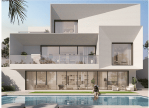 View of Yachtside Marina Residences at sunset with buildings, palm trees, and beach