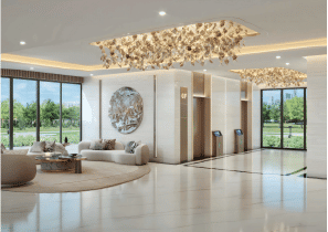 View of Yachtside Marina Residences at sunset with buildings, palm trees, and beach