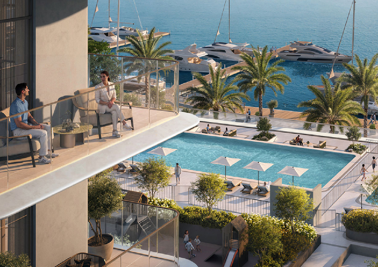 Yachtside Marina Residences with yachts docked in the marina and modern buildings in background