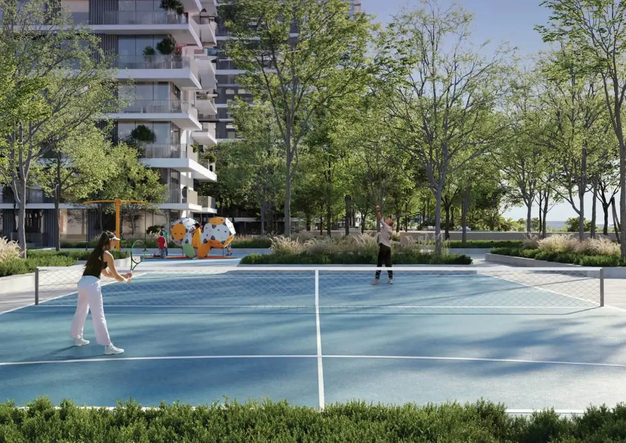 Yachtside Marina Residences with yachts docked in the marina and modern buildings in background