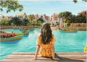 Yachtside Marina Residences with yachts docked in the marina and modern buildings in background