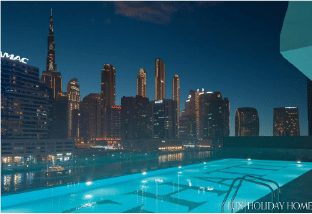 Interior view of a bedroom in Yachtside Marina Residences with large window and modern decor