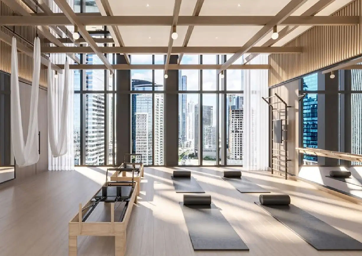 Interior view of a bedroom in Yachtside Marina Residences with large window and modern decor