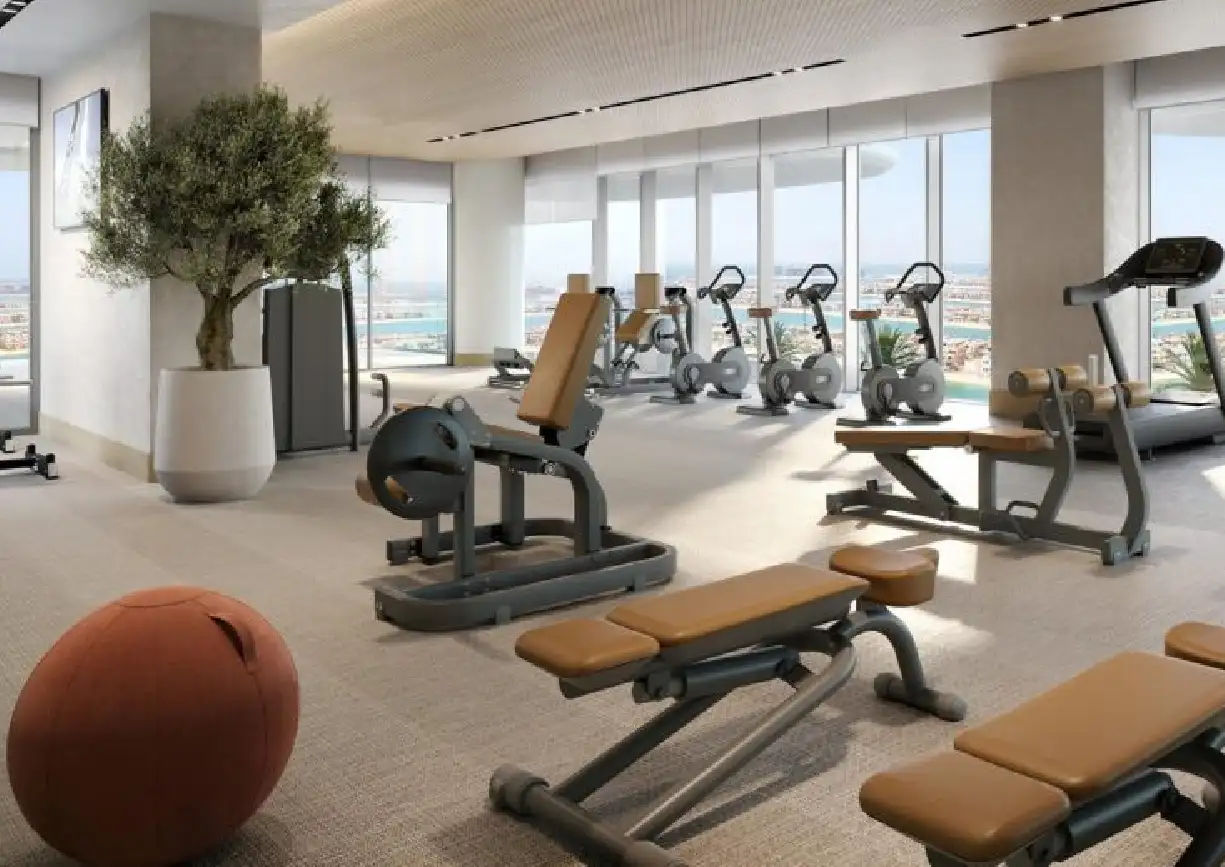 Interior view of a living and dining area in Yachtside Marina Residences with large windows and ocean view