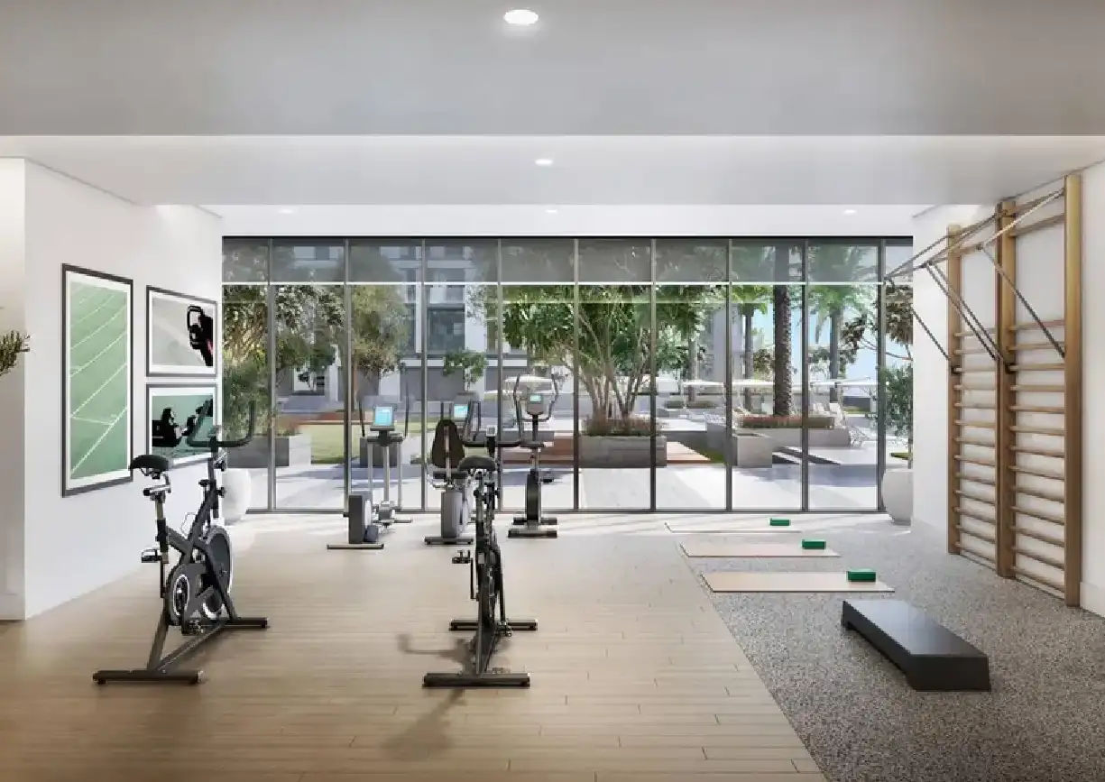 Interior view of a living and dining area in Yachtside Marina Residences with large windows and ocean view