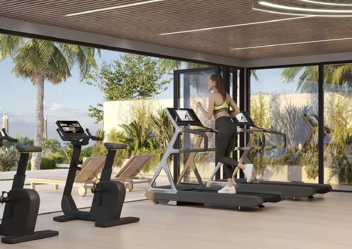 Interior view of a living and dining area in Yachtside Marina Residences with large windows and ocean view