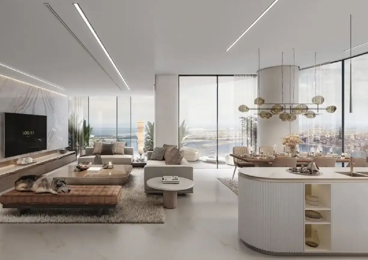 Interior view of a living and dining area in Yachtside Marina Residences with large windows and ocean view