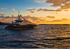 Interior view of a living and dining area in Yachtside Marina Residences with large windows and ocean view
