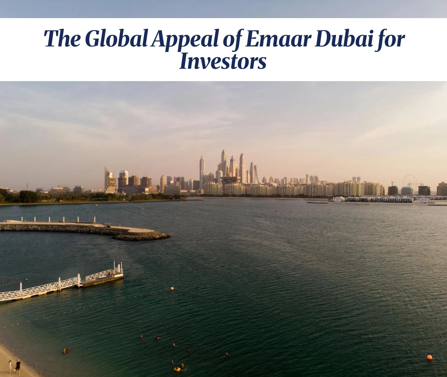 Dubai skyline at sunset, featuring iconic Emaar properties.