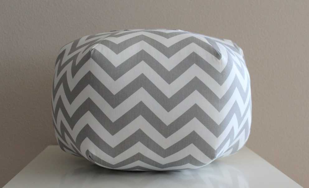 Featured Photo of White And Light Gray Cylinder Pouf Ottomans