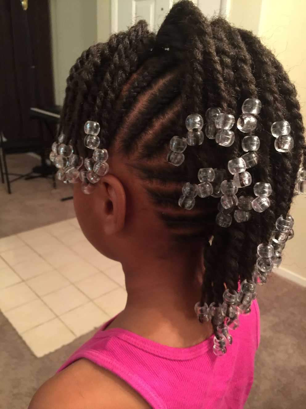 Featured Photo of Cornrows With Artistic Beaded Twisted Bun
