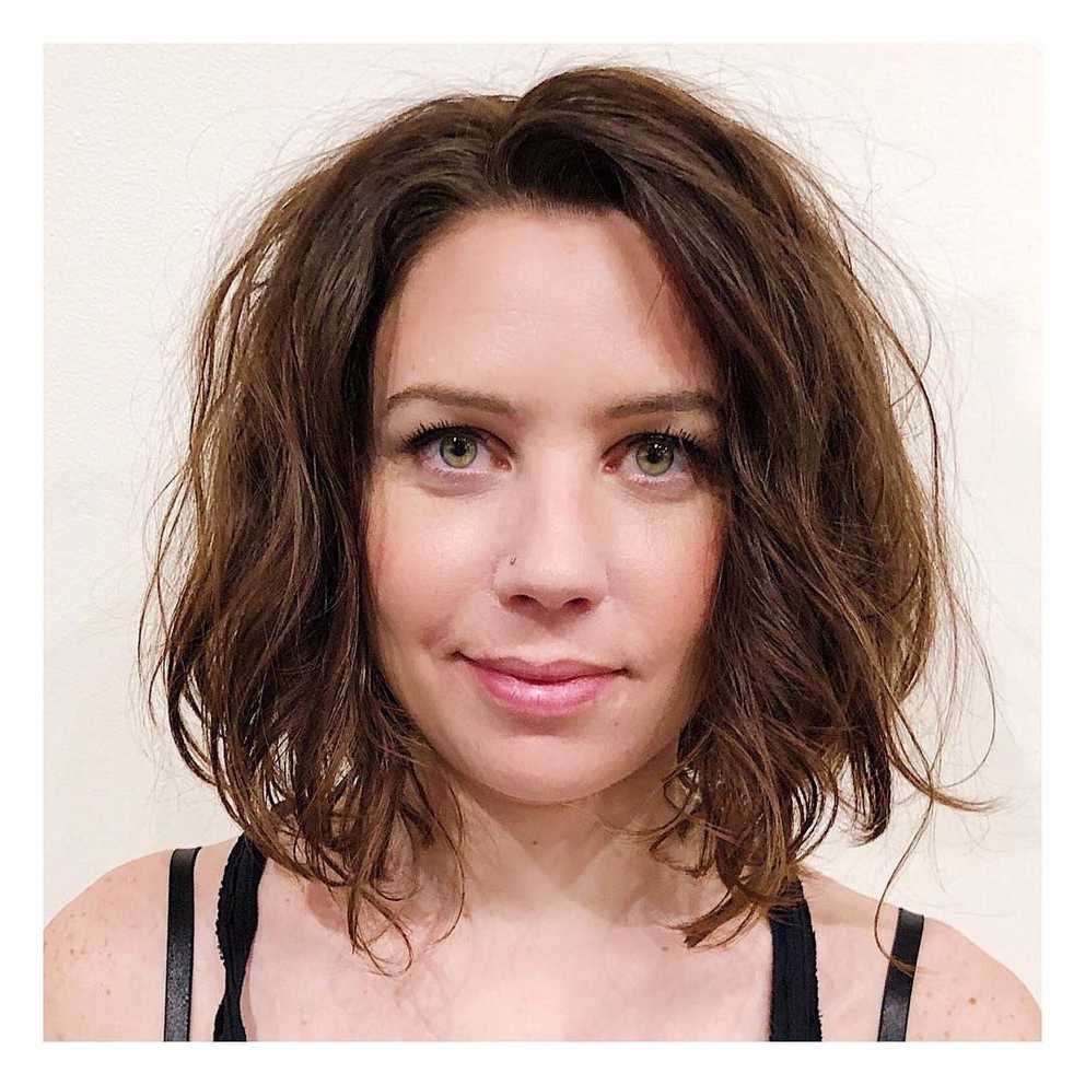 Women's Side Swept Layered Bob With Wavy Messy Bedhead Texture And With Famous Bedhead Layers For Long Hairstyles (Gallery 11 of 20)