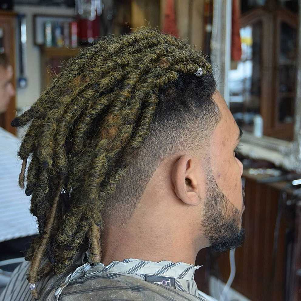 Dreadlock Styles For Men For Newest Tightly Coiled Gray Dreads Bun Hairstyles (Gallery 8 of 20)