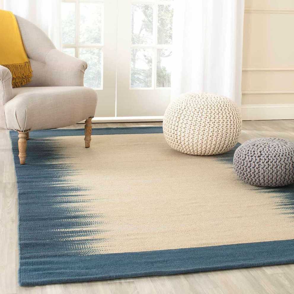 Cozy Sitting Room With Flat Woven Off White Tribal Jute Wool Rug (Photo 1 of 15)