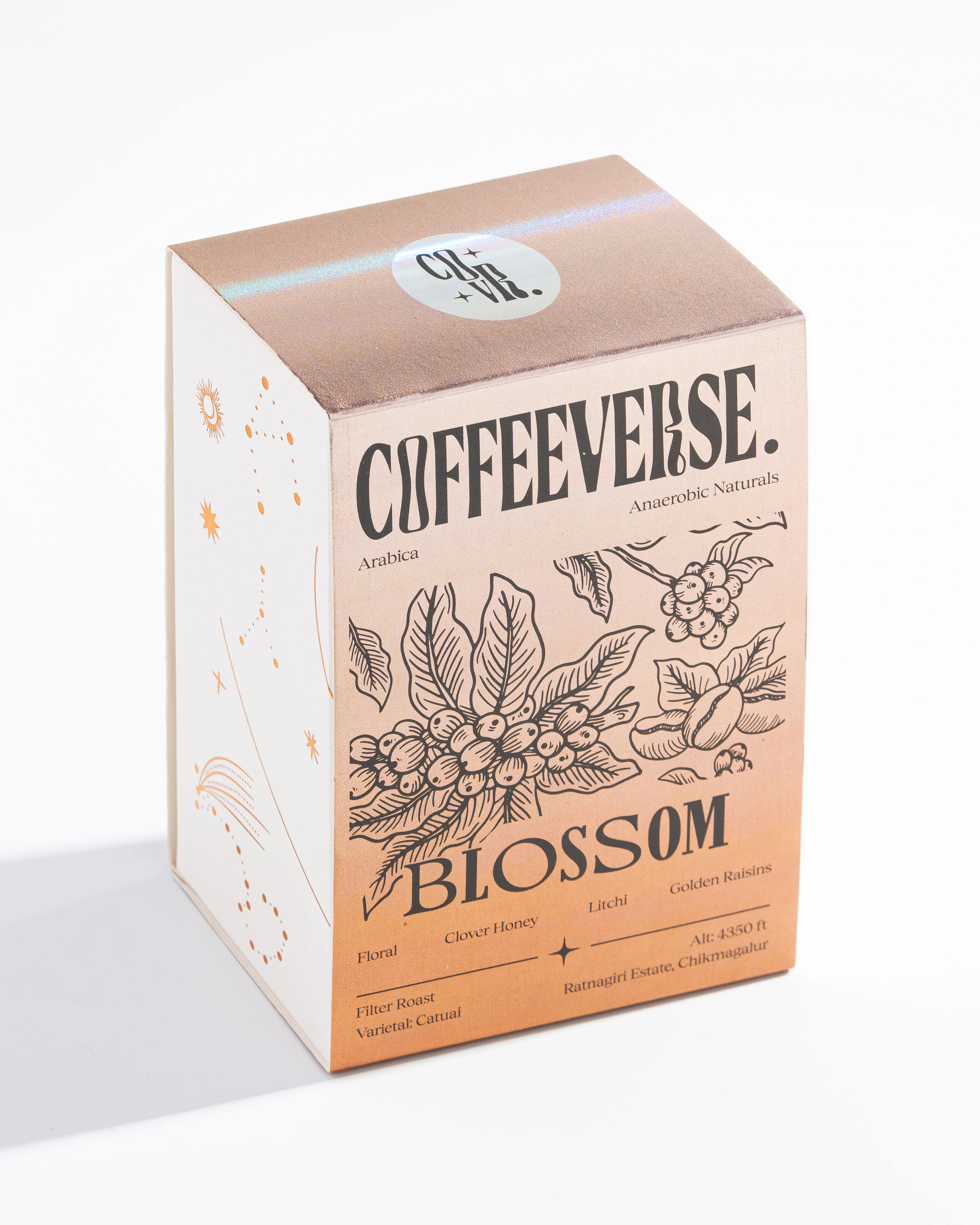 Blossom Naturals coffee packaging with floral design and artisanal details.