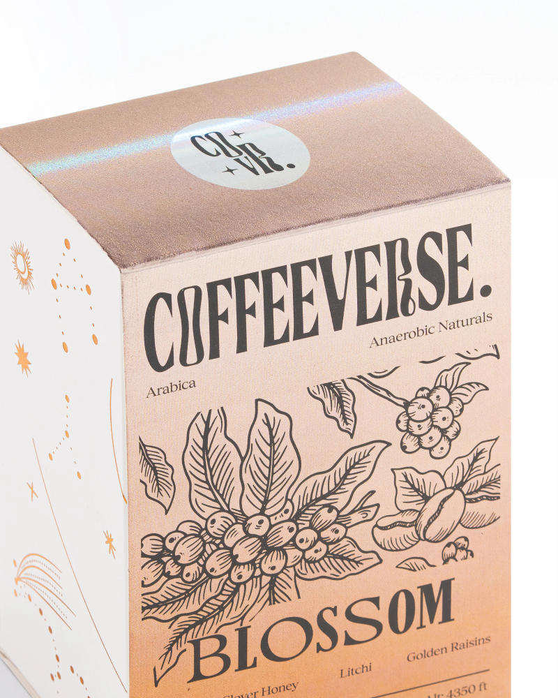 Blossom Naturals coffee packaging showcasing anaerobic processed Arabica beans.