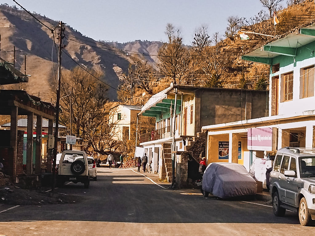 Pantwari main street with shops on both sides, that's me parked right there