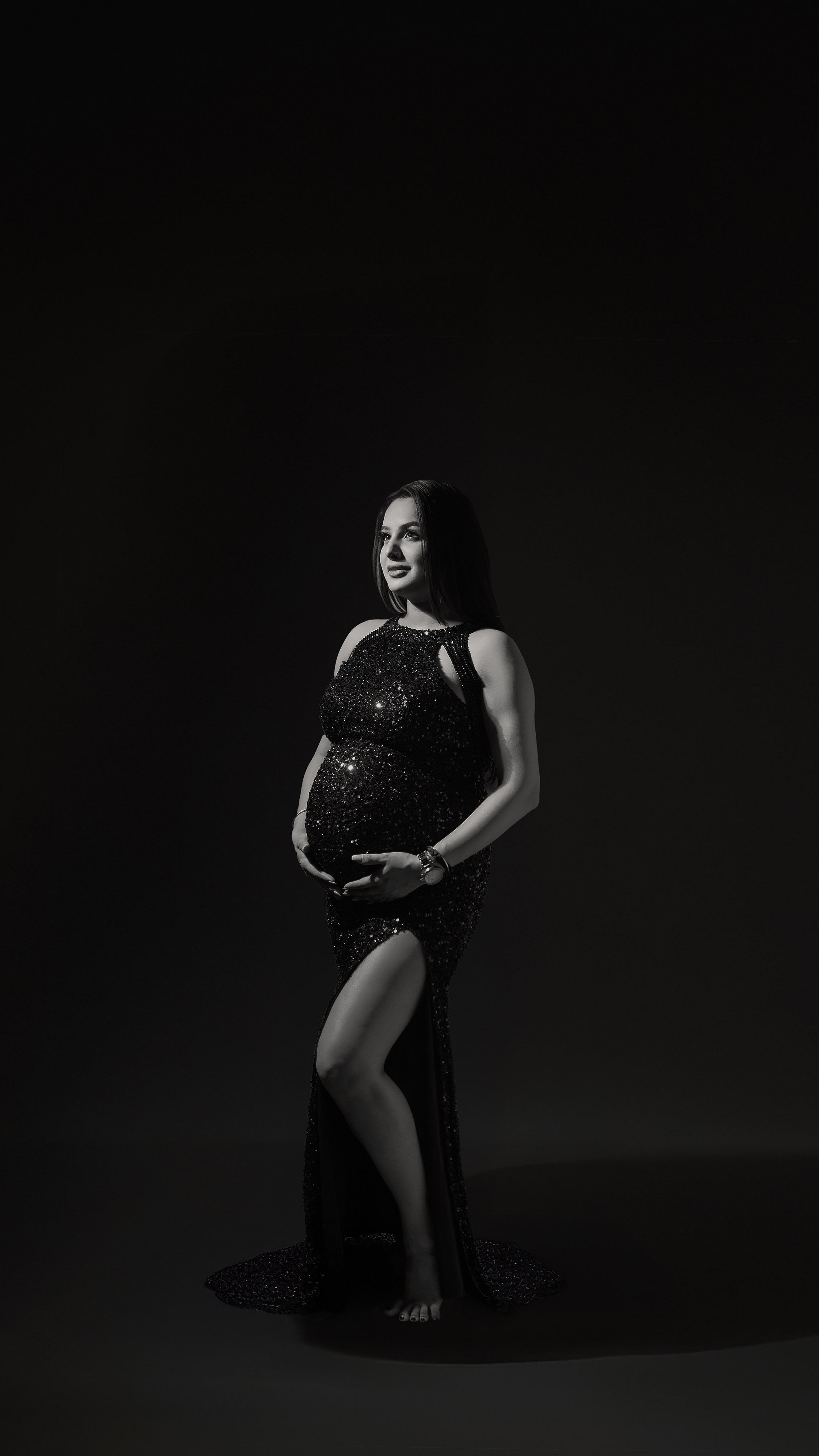 Elegant seated maternity portrait