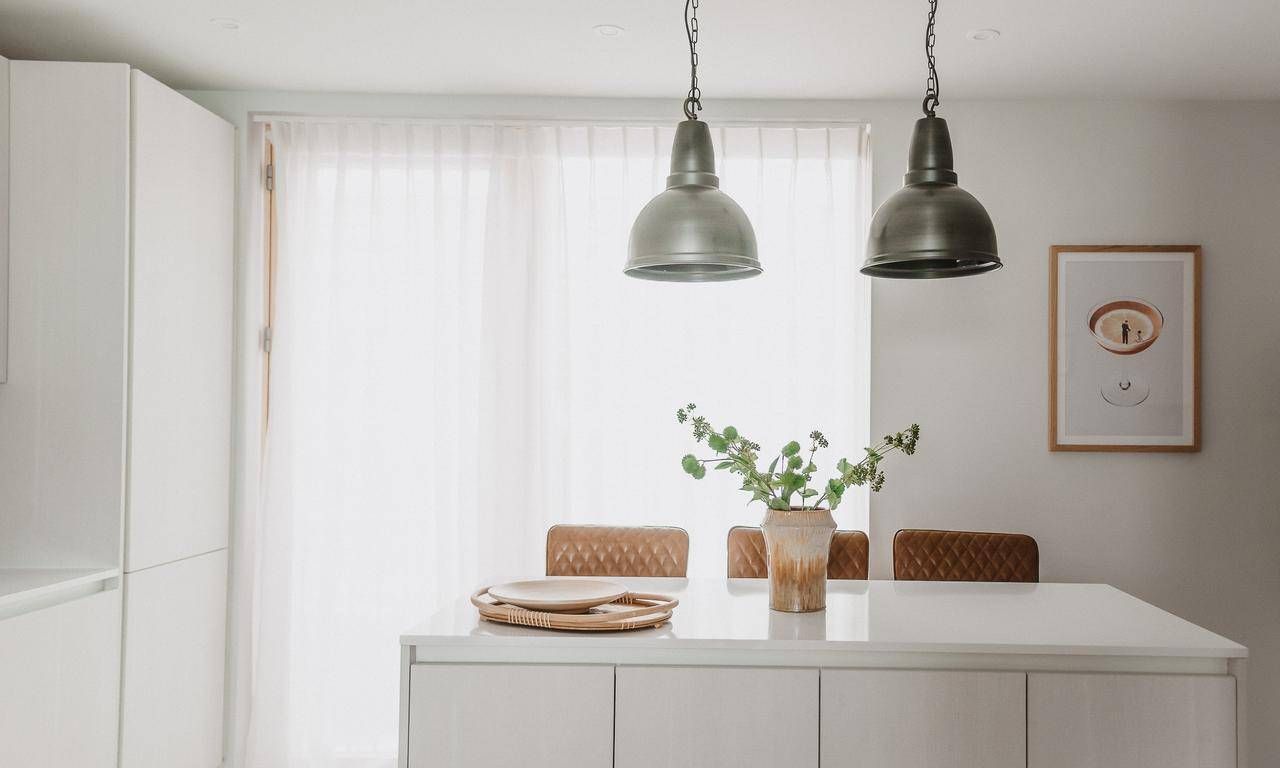 Modern style white colour palette kitchen with retro dome pewter pendants