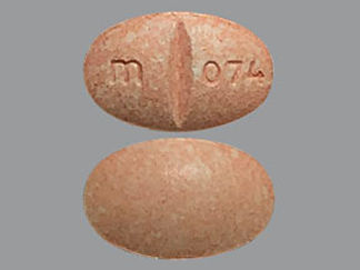 This is a Tablet imprinted with m on the front, 074 on the back.