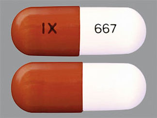 This is a Capsule imprinted with IX on the front, 667 on the back.