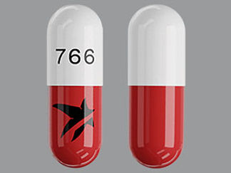 This is a Capsule imprinted with 766 on the front, logo on the back.