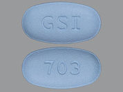 Truvada: Esto es un Tableta imprimido con GSI en la parte delantera, 703 en la parte posterior, y es fabricado por None.