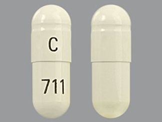 This is a Capsule imprinted with C on the front, 711 on the back.