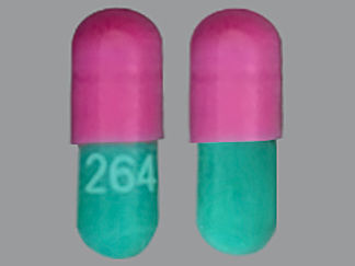 This is a Capsule Dr imprinted with 264 on the front, nothing on the back.