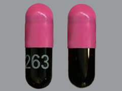 Esto es un Cápsula LP rosado oblongo imprimido con 263 en la parte delantera, nada en la parte posterior, y es fabricado por ASCEND LABORATO.