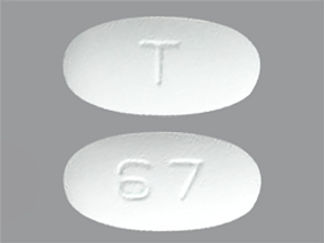 Esto es un Tableta Er 24 Hr imprimido con T en la parte delantera, 67 en la parte posterior, y es fabricado por None.