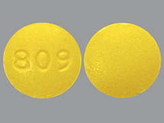 Esto es un Tableta amarillo redondo imprimido con 809 en la parte delantera, nada en la parte posterior, y es fabricado por ANDAPHARM, LLC.