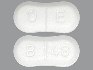 This is a Tablet imprinted with O E on the front, B 48 on the back.