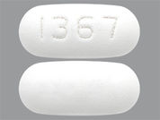 Emtricitabine-Tenofovir Disop: This is a Tablet imprinted with 1367 on the front, nothing on the back.