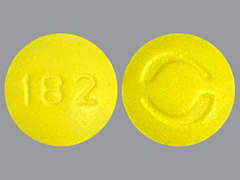 This is a yellow round Tablet imprinted with 182 on the front, Logo on the back, and is manufactured by OXFORD PHARMACE.