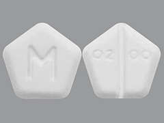 This is a white five-sided Tablet imprinted with 0200 on the front, M on the back, and is manufactured by SEBELA/LEGACY P.