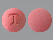 Zolpidem Tartrate Er: This is a Tablet Er Multiphase imprinted with T on the front, nothing on the back.