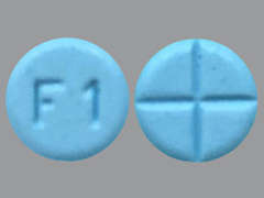 This is a light blue round Tablet imprinted with F1 on the front, nothing on the back, and is manufactured by ORYZA PHARMACEU.