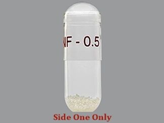 This is a Capsule Sprinkle imprinted with INF-0.5 on the front, nothing on the back.