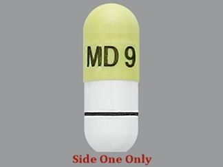 This is a Capsule imprinted with MD 9 on the front, nothing on the back.