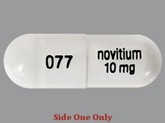 Esto es un Cápsula imprimido con 077 en la parte delantera, Novitium 10 mg en la parte posterior, y es fabricado por None.